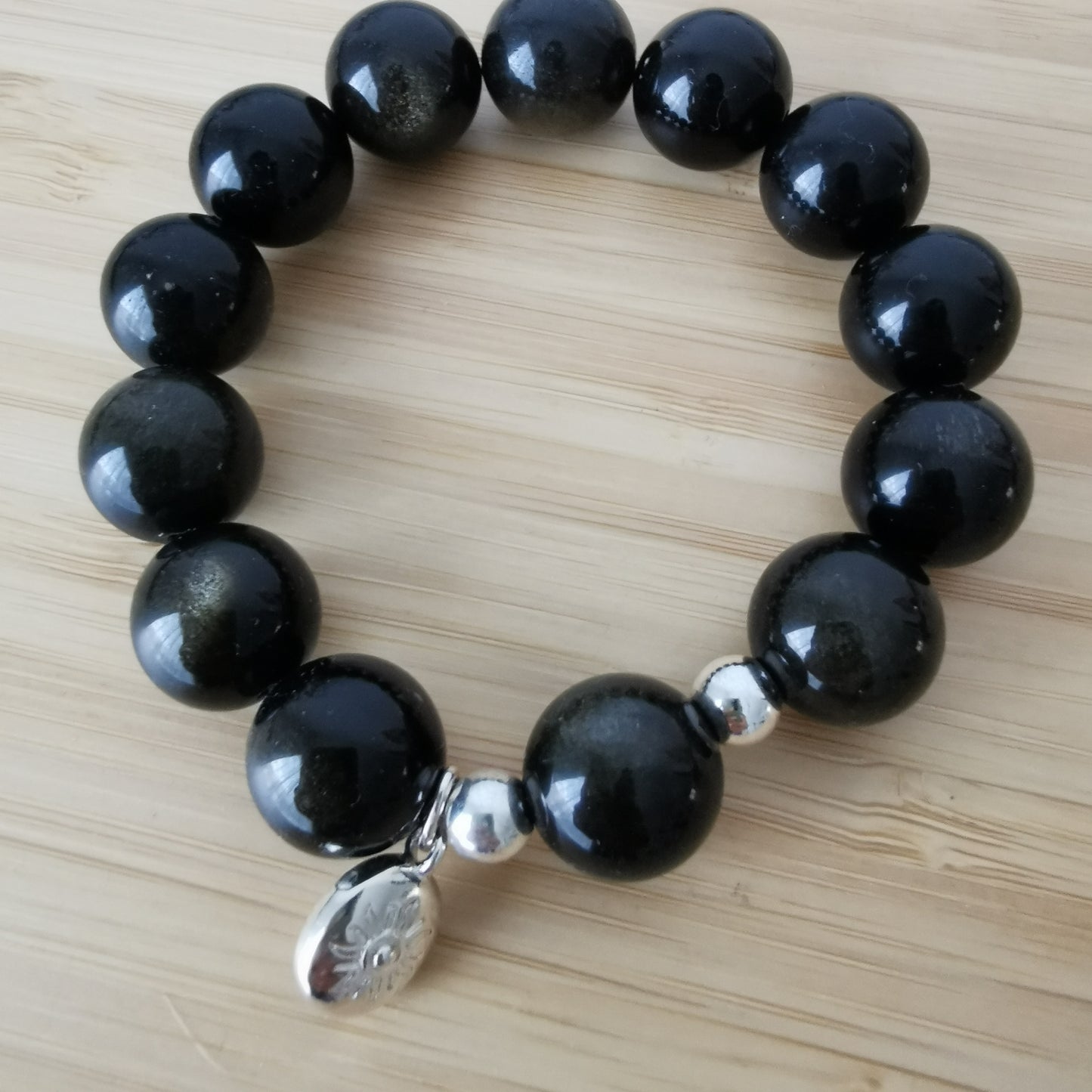 Bracelet grosses perles Obsidienne dorée