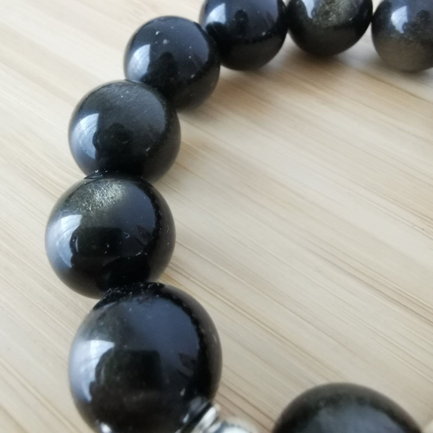 Bracelet grosses perles Obsidienne dorée